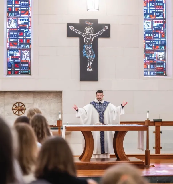 Priest presiding over Catholic Mass.